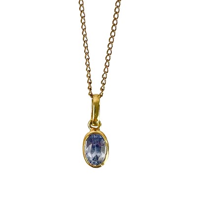 Lot 210 - A high purity gold cornflower blue sapphire set pendant on a slender 9ct necklace.