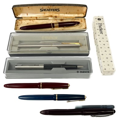 Lot 537 - A Sheaffer pen with 14k nib and two Parker Slimfold pens with 14k nibs.