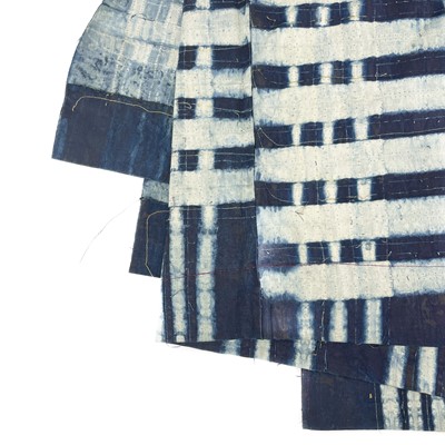 Lot 169 - A Nigerian blue and white cotton adire cloth.