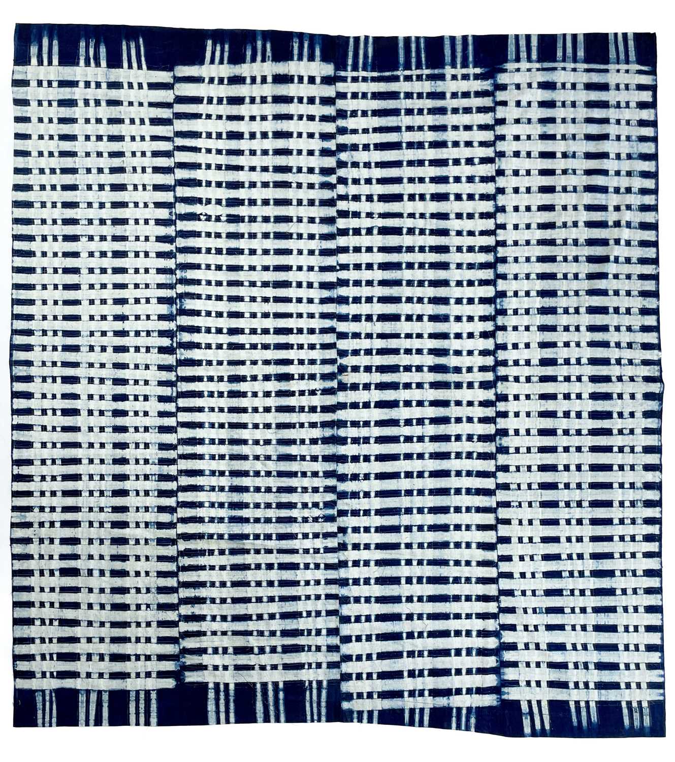 Lot 169 - A Nigerian blue and white cotton adire cloth.