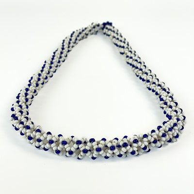 Lot 148 - A West African bronze ring, a beadwork necklace and armband.