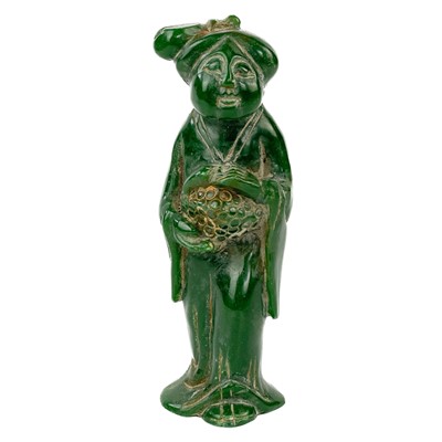 Lot 380 - A Chinese green hardstone figure of a lady.