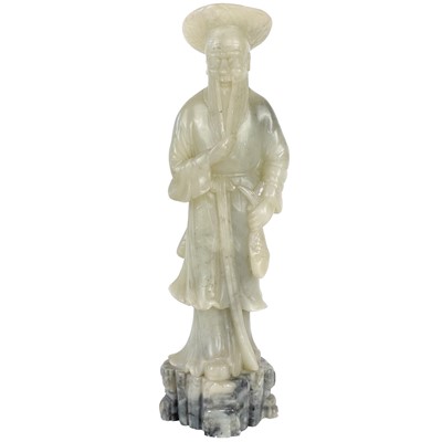 Lot 383 - A Chinese soapstone figure of a fisherman, early 20th century.