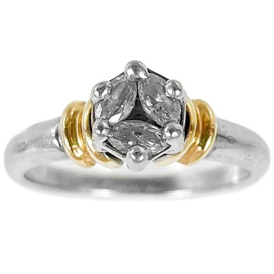 Lot 322 - A contemporary 18ct bi-colour diamond set three stone ring.