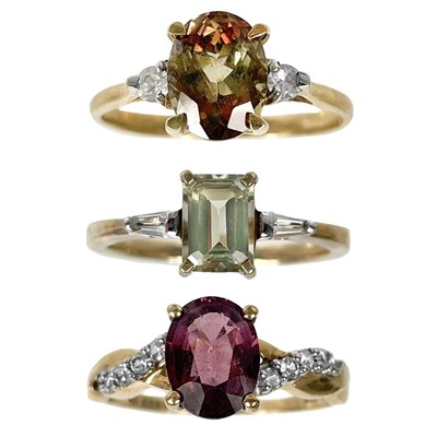 Lot 235 - Three 9ct contemporary gem set rings.