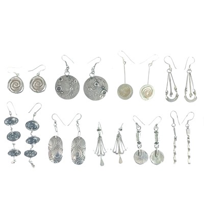 Lot 516 - Nine pairs of silver drop earrings