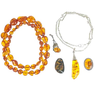 Lot 505 - A collection of amber and silver jewellery