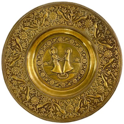 Lot 178 - A large Persian brass charger, 19th century.