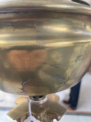 Lot 251 - A Victorian brass oil lamp with an etched cranberry glass shade.