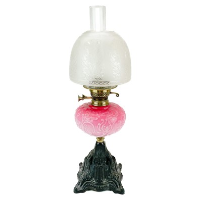 Lot 45 - A Victorian brass oil lamp with etched glass shade.