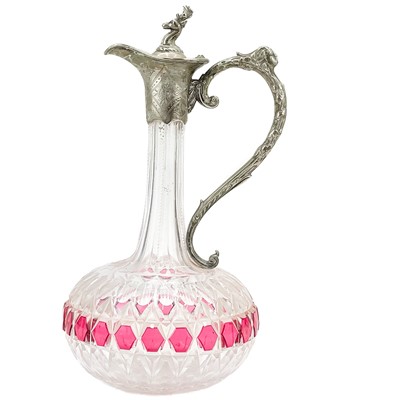 Lot 509 - A Victorian cut glass and silver plated claret jug.