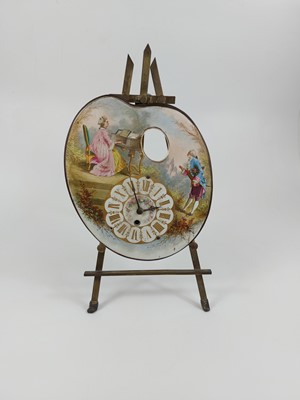 Lot 328 - A French artist's palette form easel timepiece.