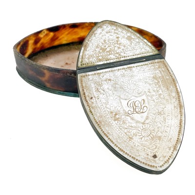 Lot 4 - A George III mother of pearl and tortoiseshell navette shape snuff box.