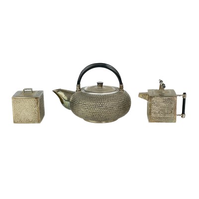 Lot 403 - A Japanese metal three piece tea service.