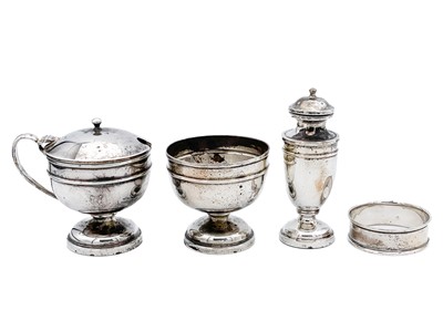 Lot 5 - A George V silver three piece cruet set by Henry Clifford Davis.