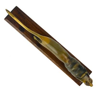 Lot 414 - A Chinese carved horn model of a lion, early 20th century.