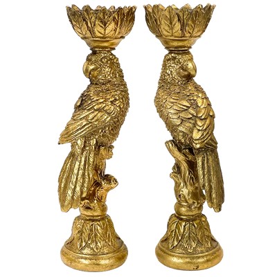 Lot 132 - A pair of gilt resin parrot candlesticks.