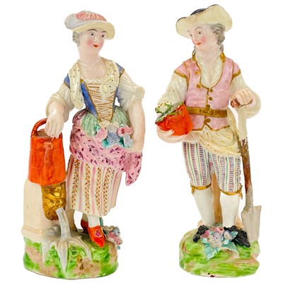 Lot 593 - A pair of English porcelain figures of gardeners.