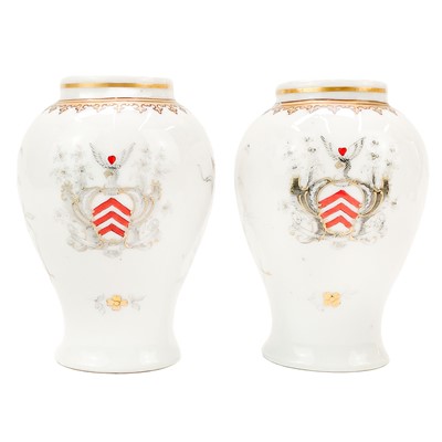 Lot 480 - A pair of armorial baluster vases.