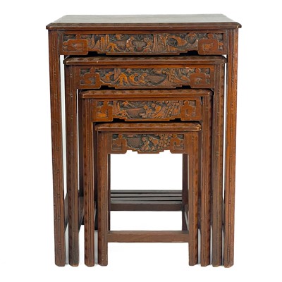 Lot 420 - A Chinese carved hardwood quartetto of tables, mid 20th century.