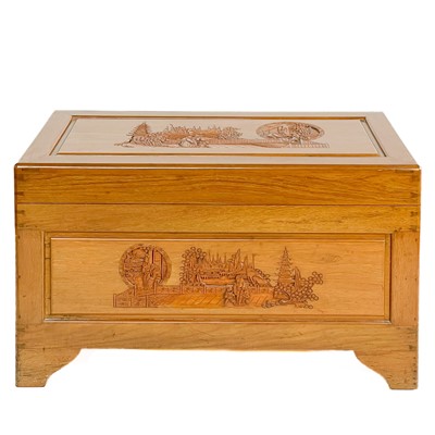 Lot 424 - A Chinese carved camphor wood blanket box, mid 20th century.