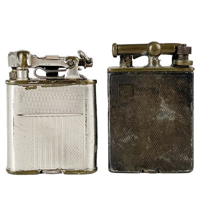 Lot 258 - A Sterling silver engine turned pocket lighter.