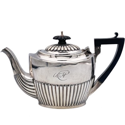 Lot 28 - An Edwardian silver bachelor teapot by Charles Harris & Co.