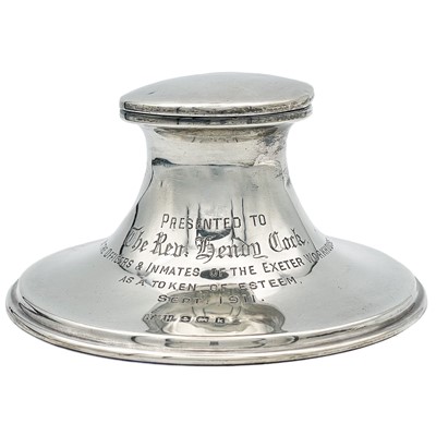 Lot 45 - An Edwardian silver capstan inkwell.