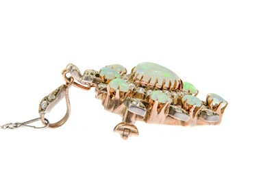 Lot 301 - An exquisite Edwardian diamond and opal heart shaped brooch pendant by Depree & Young Ltd Exeter.