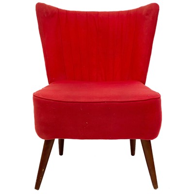 Lot 711 - A mid century upholstered cocktail chair.