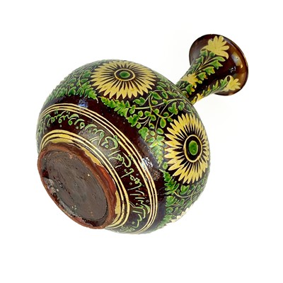 Lot 184 - An Islamic pottery vase, probably Bombay School of Arts, late 19th century.