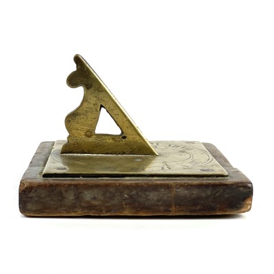 Lot 39 - A miniature brass sundial.