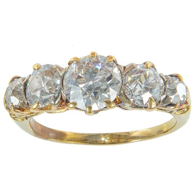 Lot 317 - An early 20th century 18ct gold five stone diamond ring.