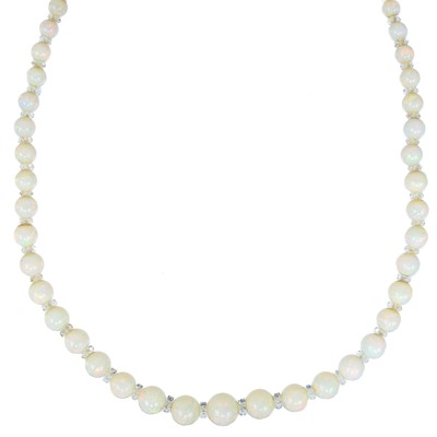 Lot 318 - A 1920's white opal graduated bead necklace.