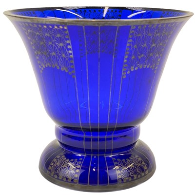 Lot 554 - An Austrian blue glass vase with secessionist style gilt decoration.