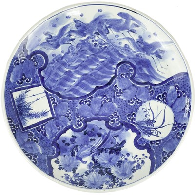 Lot 183 - A large Japanese blue and white porcelain charger, Meiji period.