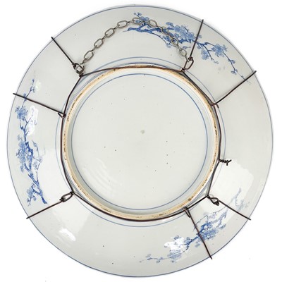 Lot 190 - A Japanese blue and white porcelain charger, Meiji period.