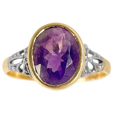 Lot 238 - An early 20th century 18ct yellow and white gold amethyst and diamond set ring.