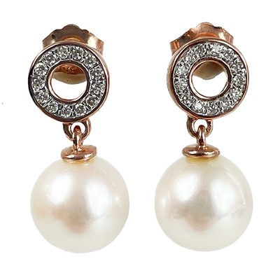 Lot 254 - A pair of contemporary 9ct rose gold cultured pearl drop and diamond set earrings.