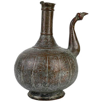 Lot 209 - A Persian copper water jug, 19th century