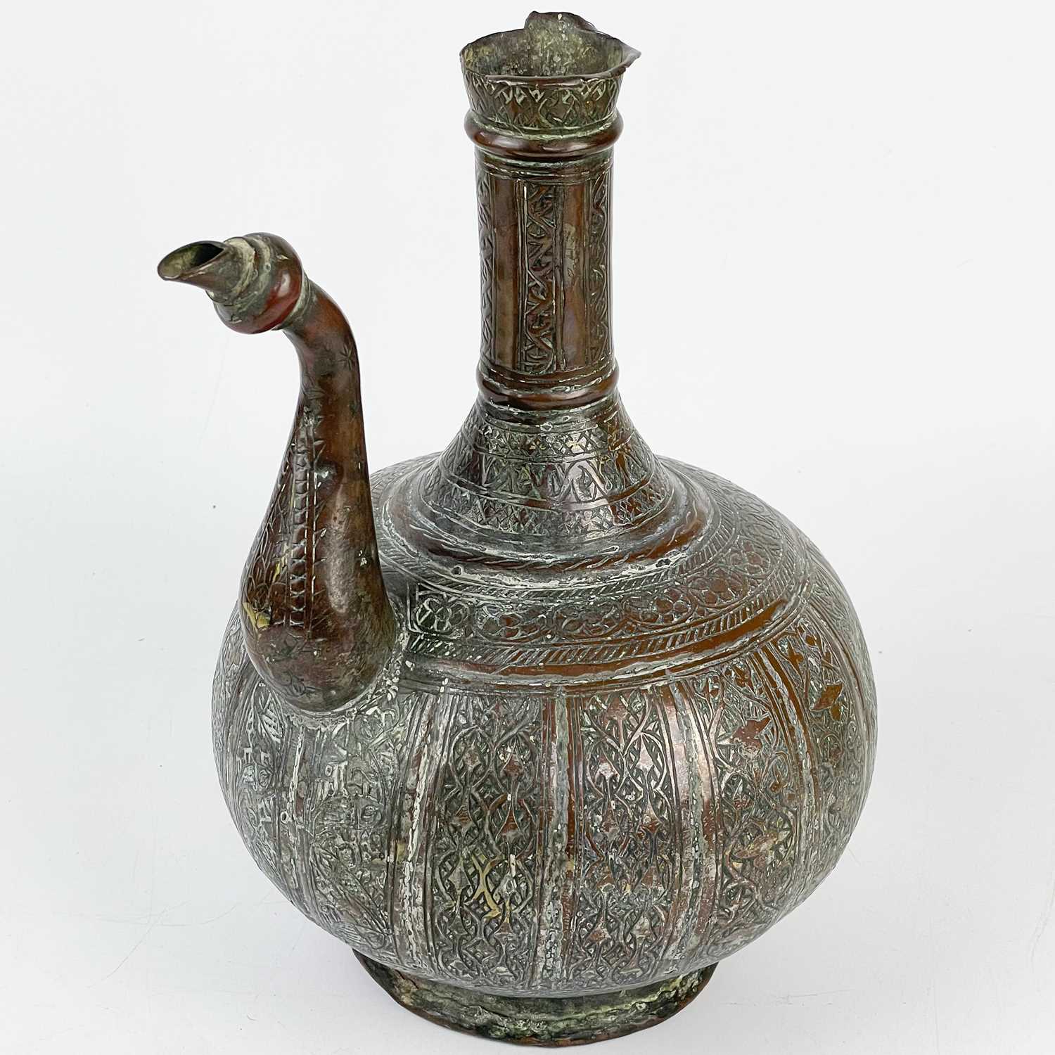 Lot 209 - A Persian copper water jug, 19th century,