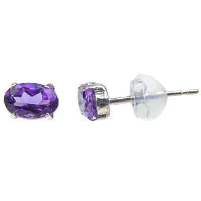 Lot 282 - A pair of 18ct white gold oval amethyst set stud earrings.