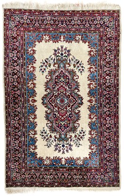 Lot 250 - An Indian rug of Persian Kerman design, circa 1930's.