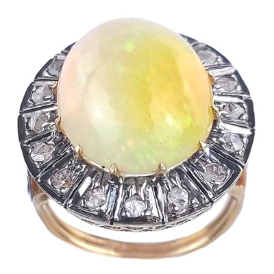 Lot 327 - A large 14ct gold and silver oval cabochon opal and rose cut diamond halo cocktail ring.