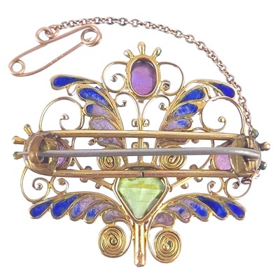 Lot 320 - Frederick James Partridge (1877-1942) A plique-à-jour purple sapphire & green garnet set brooch.