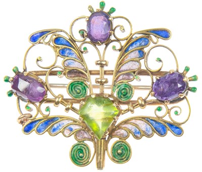 Lot 320 - Frederick James Partridge (1877-1942) A plique-à-jour purple sapphire & green garnet set brooch.