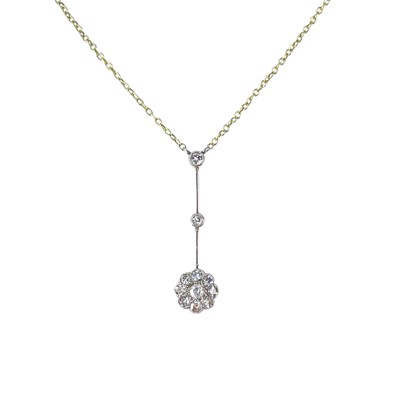 Lot 419 - An early 20th century gold and platinum Edna May diamond set pendant necklace.