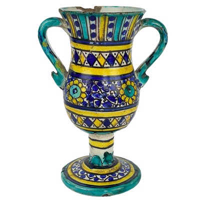 Lot 218 - A Moroccan pottery twin-handled goblet, 19th century.