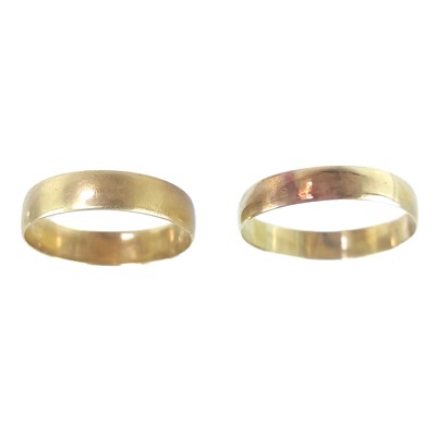 Lot 329 - Two gold band rings.