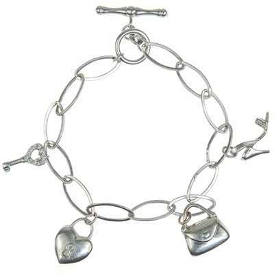 Lot 332 - A contemporary 9ct white gold and CZ set charm bracelet.